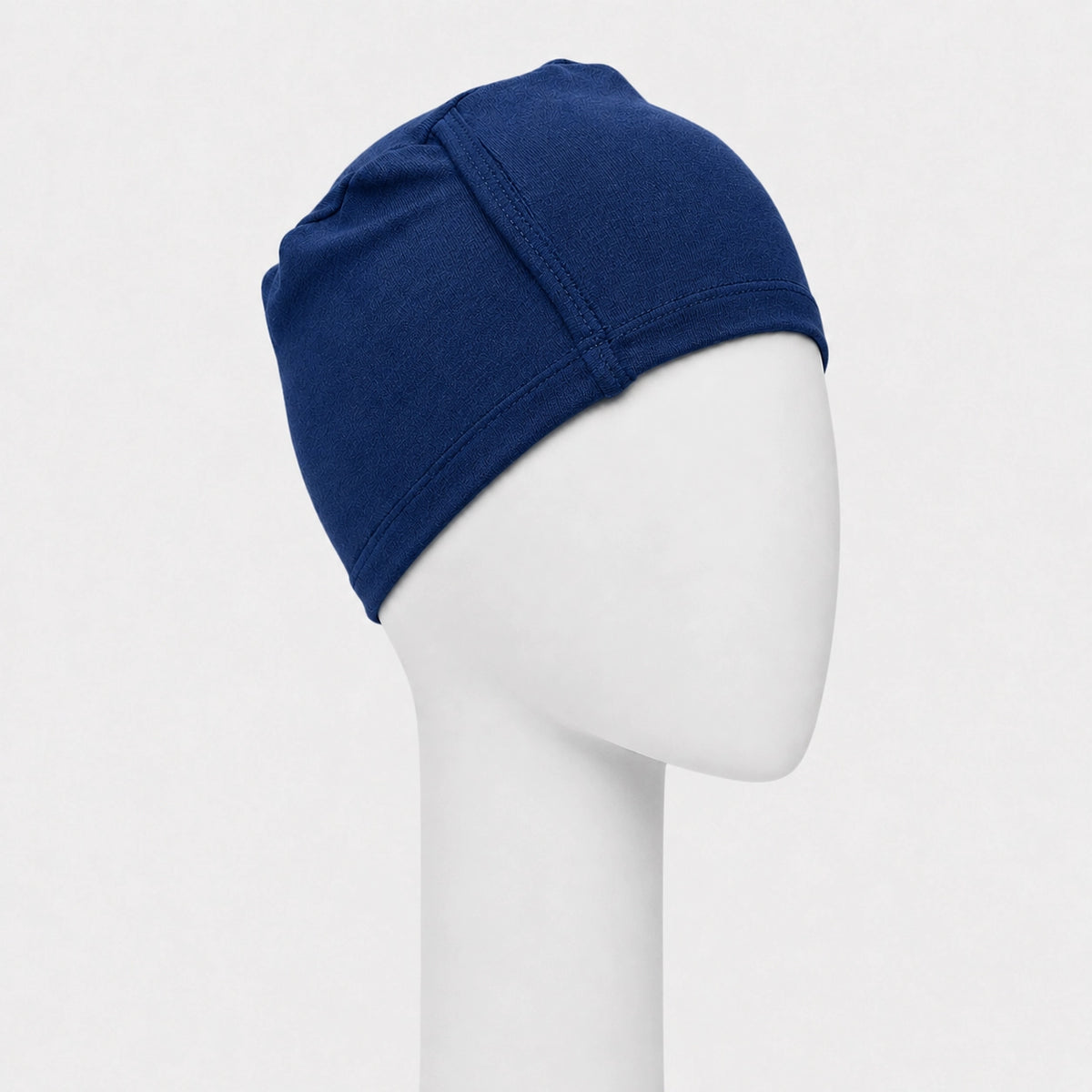 Bonnet de nuit en bambou Sibelle bleu capitaine sur fond blanc