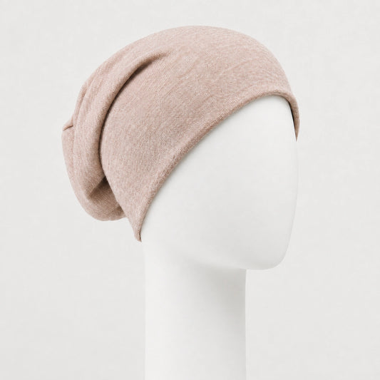 Bonnet chimio en tricot rose Sibelle sur fond blanc