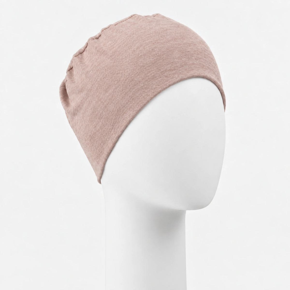 Bonnet confort Sibelle en tricot rose vue côté droit sur fond blanc