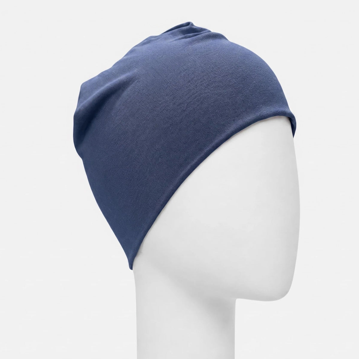 Bonnet dodo Sibelle en bambou bleu capitaine sur fond blanc