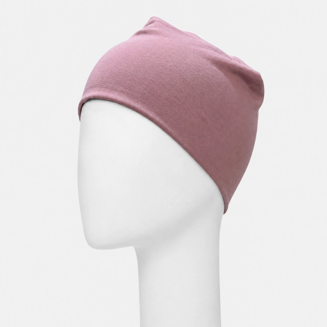 Bonnet dodo Sibelle en bambou vieux rose sur fond blanc angle 45 gauche 