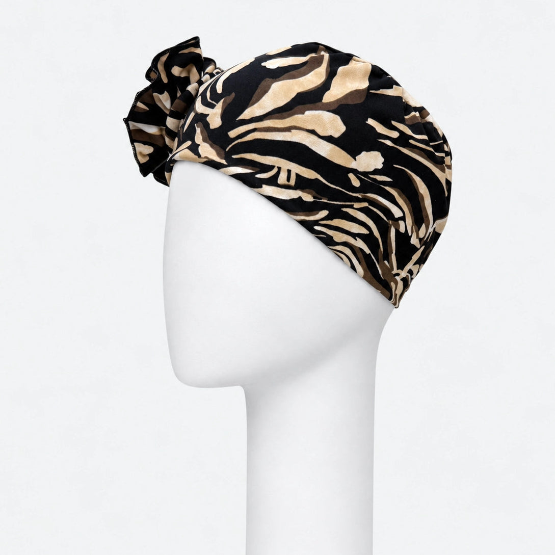 Bonnet flora Sibelle brazil noir sur fond blanc vue de côté gauche