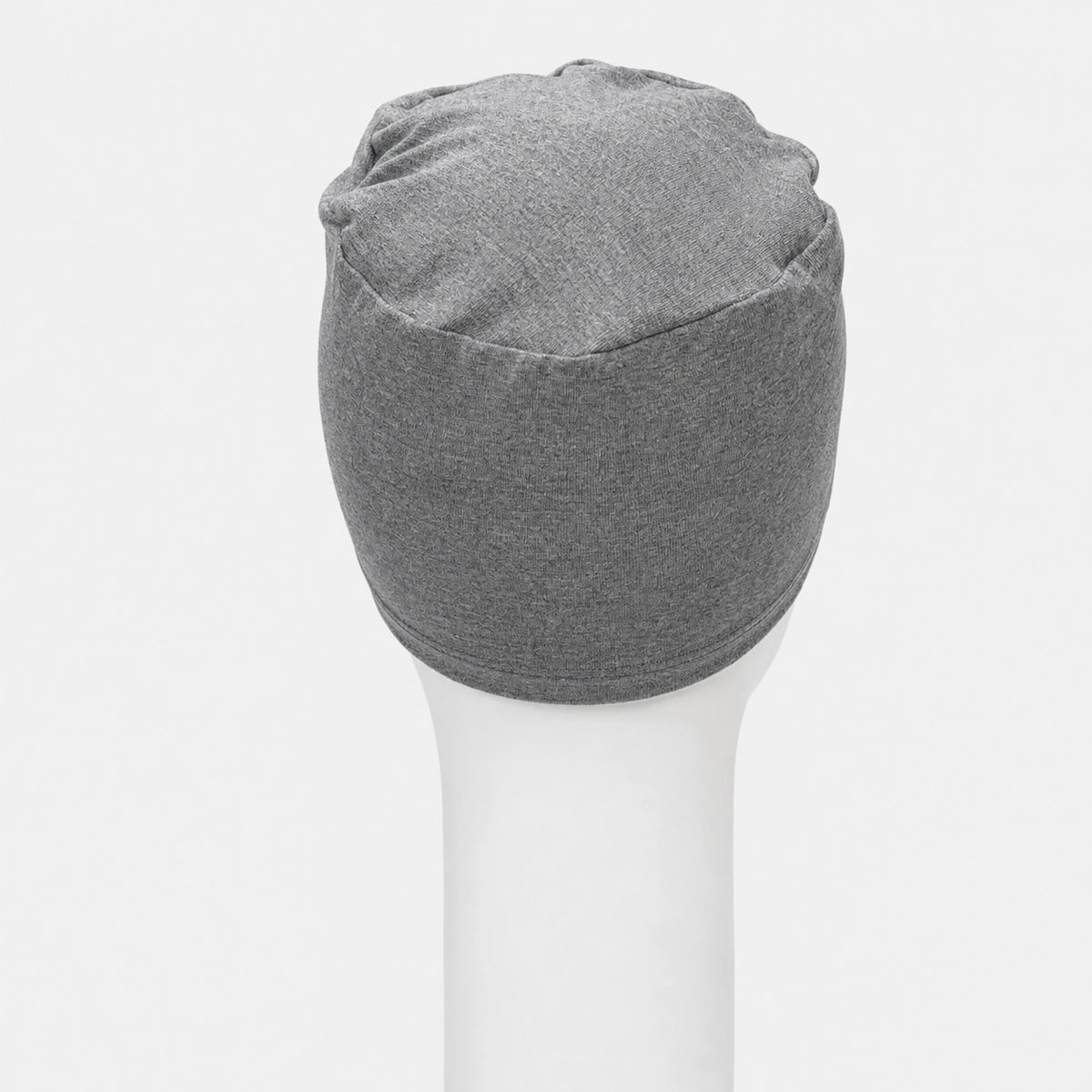 Bonnet de nuit Sibelle en bambou gris sur fond blanc vue de dos