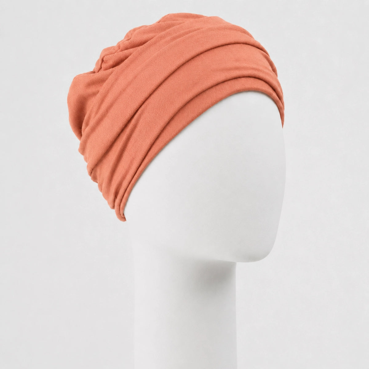 Bonnet twist en bambou corail Sibelle sur fond blanc