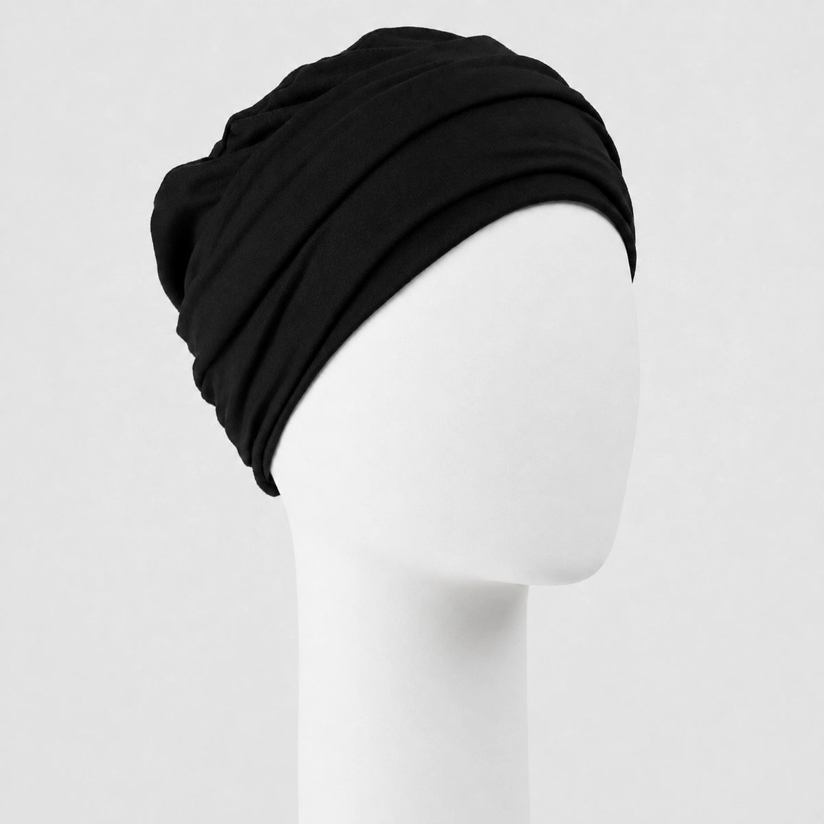 Bonnet twist en bambou noir Sibelle sur fond blanc