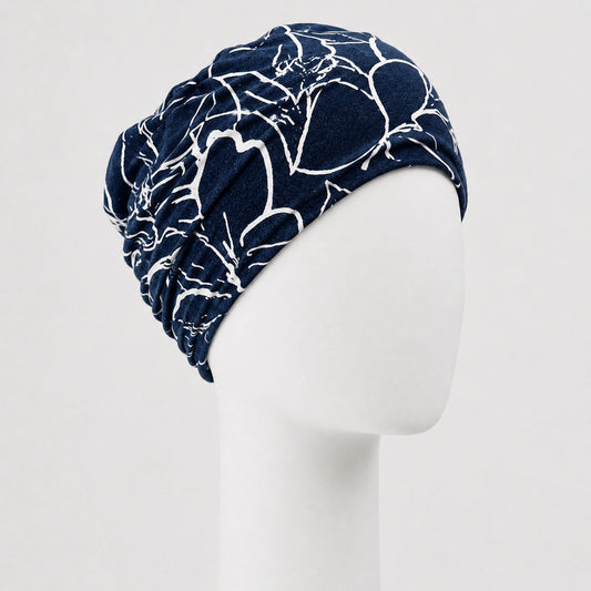 Bonnet twist darcy bleu Sibelle sur fond blanc 
