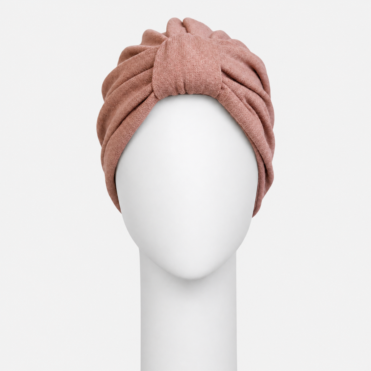 Turban urbain en tricot rose Sibelle sur fond blanc vue de face