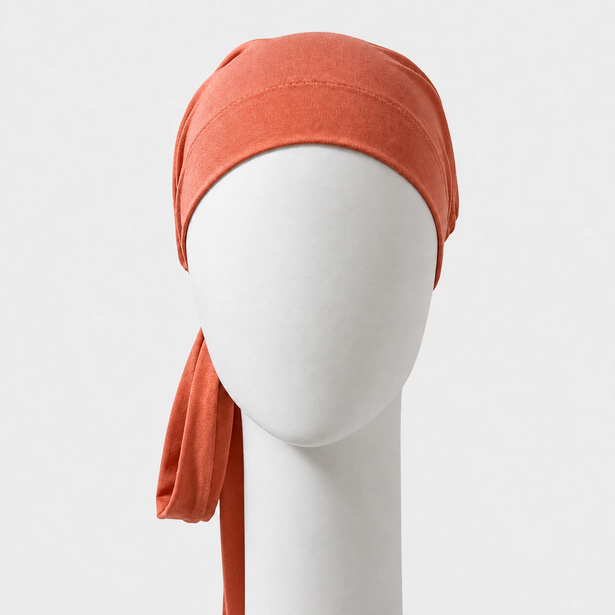 Foulard à corde en bambou corail Sibelle sur fond blanc
